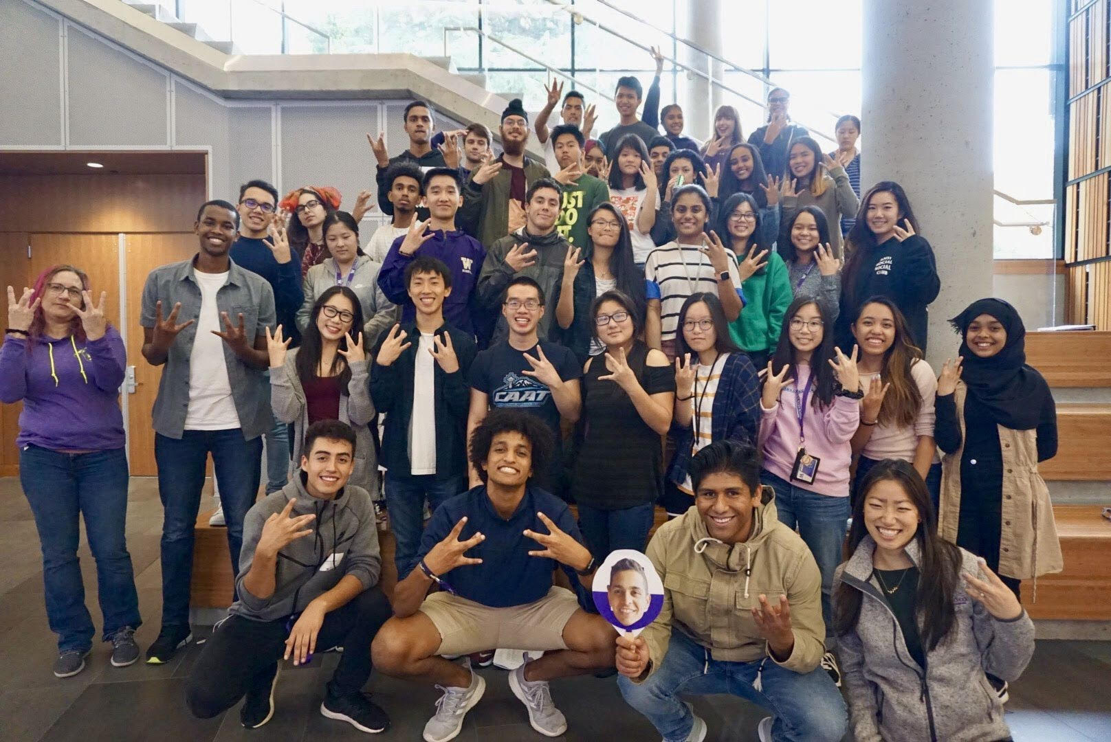 Group photo of the Startup cohort (2019) standing on different levels of stairs.